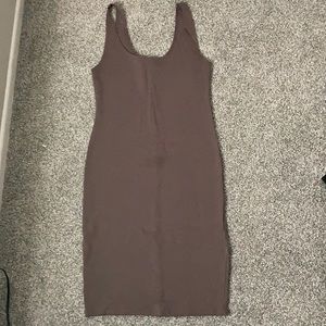 Simple soft brown tight dress.
